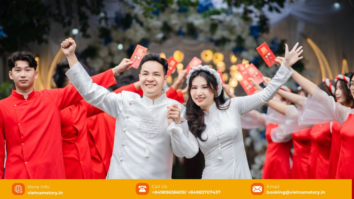Vietnamese couple in traditional red Ao Dai costumes for their wedding day