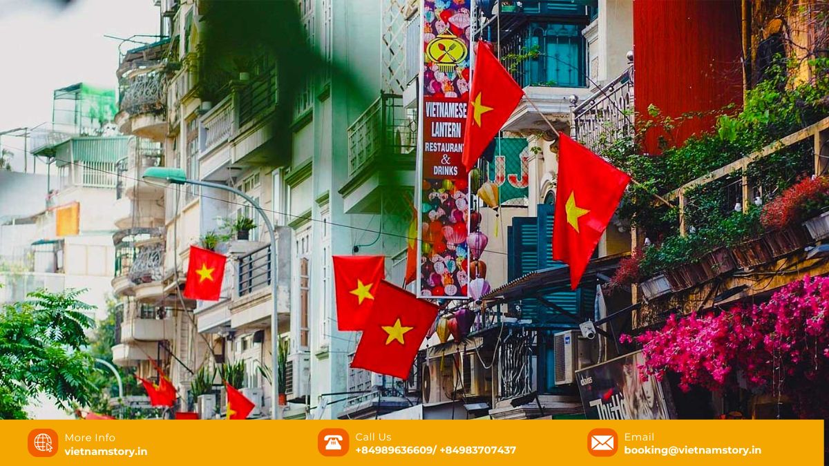 Citizens hoisting vibrant Vietnamese flags on Reunification Day, April 30th