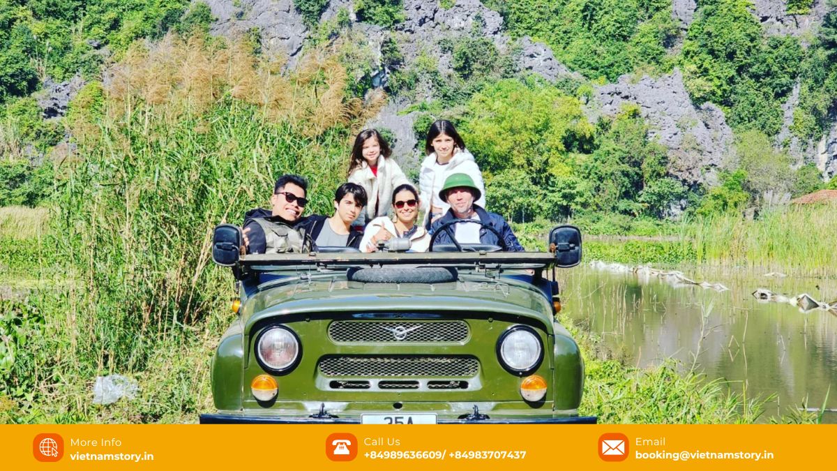 Helpful tips for Indian tourists planning a Jeep Tour in Ninh Binh, showing a jeep parked near a river.