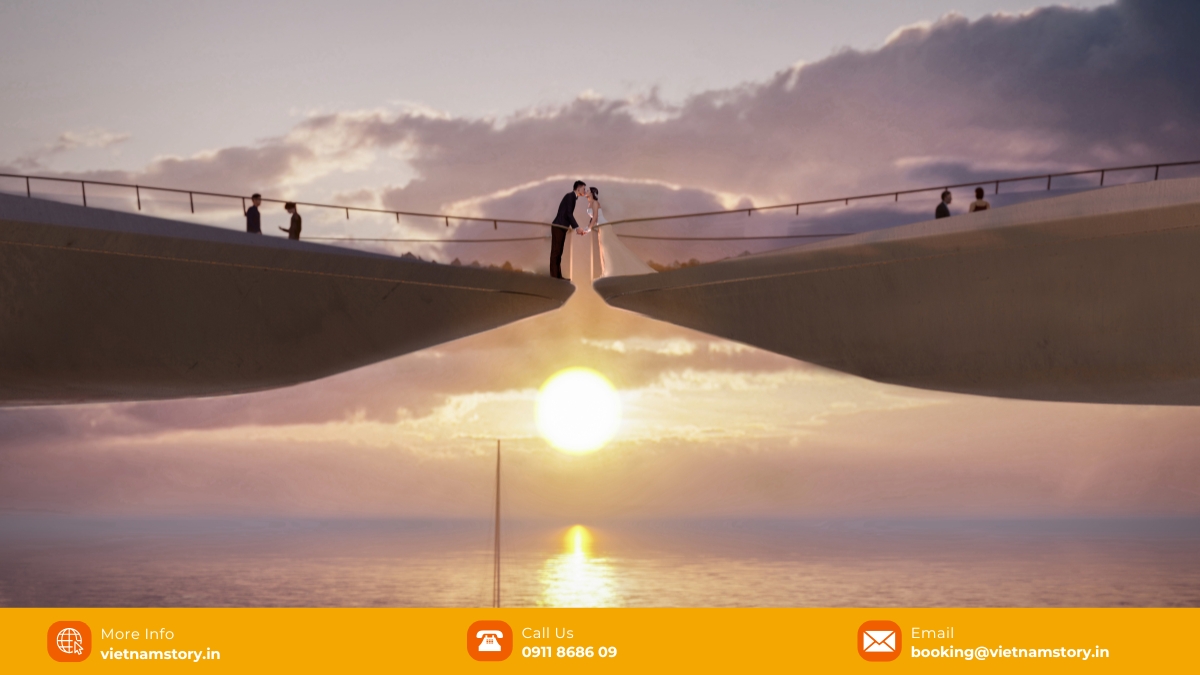 Aerial view of the two separate walkways of Kiss Bridge Phu Quoc reaching towards each other over the turquoise sea.